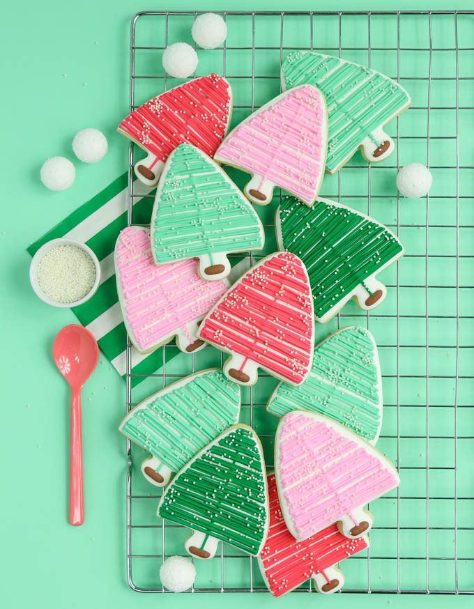 bottle brush Christmas cookies on a mint backdrop and cookie cooling rack