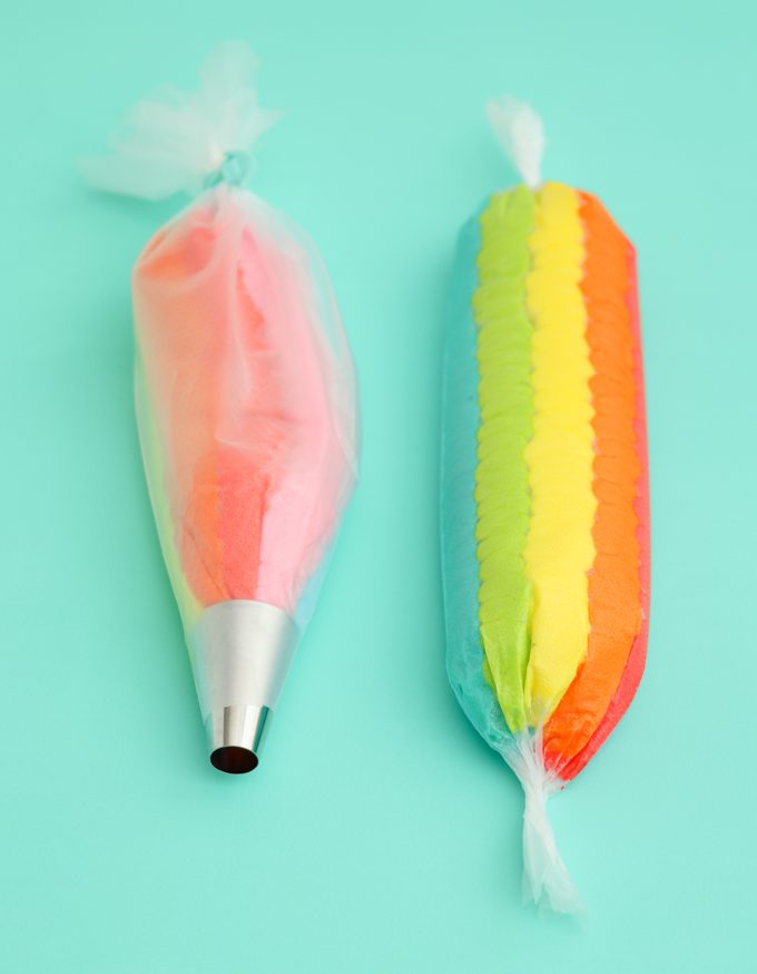 Rainbow frosting bag with large round tip.