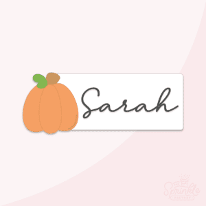 Clipart of a an orange pumpkin with a white rectangle with the name Sarah in black cursive lettering on it.