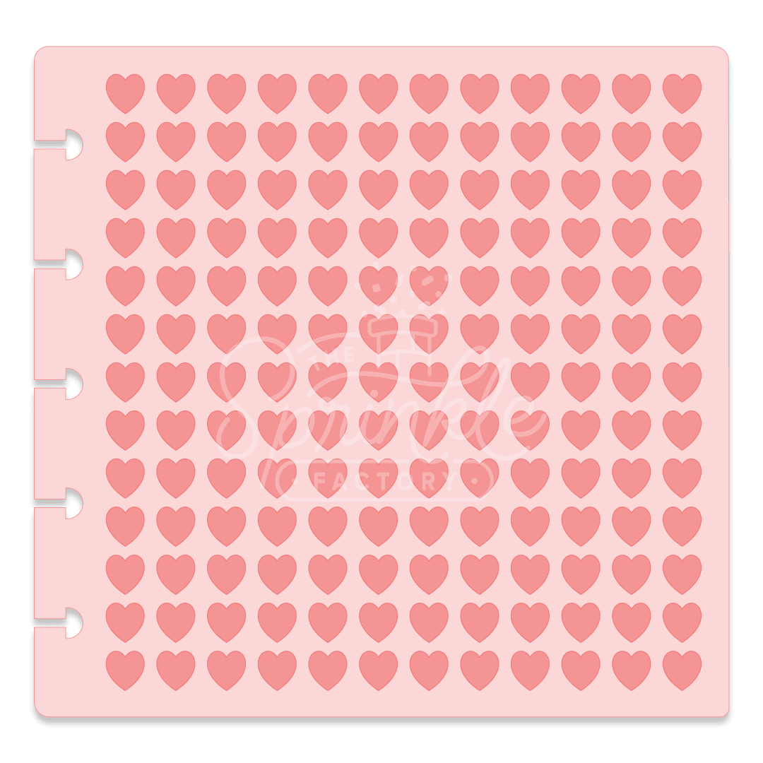 Image of a light pink stencil with rows of small red hearts.