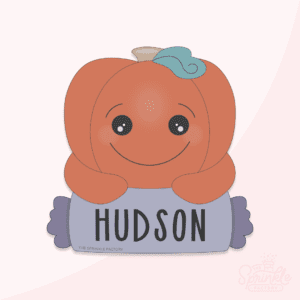 A graphic image of a candy pumpkin plaque on a pink background.