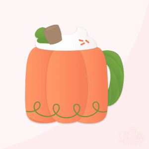 Mug shaped like an orange pumpkin with a green swirl at the bottom and a green handle with the texture of a leaf topped with whipped cream and orange sprinkles.