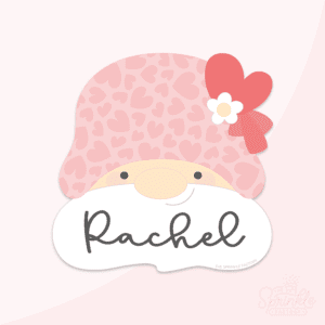 Clipart of a gnome head wearing a pink hat with darker pink hearts on it with a red heart bow and white daisy with white beard and the name Rachel written on it.