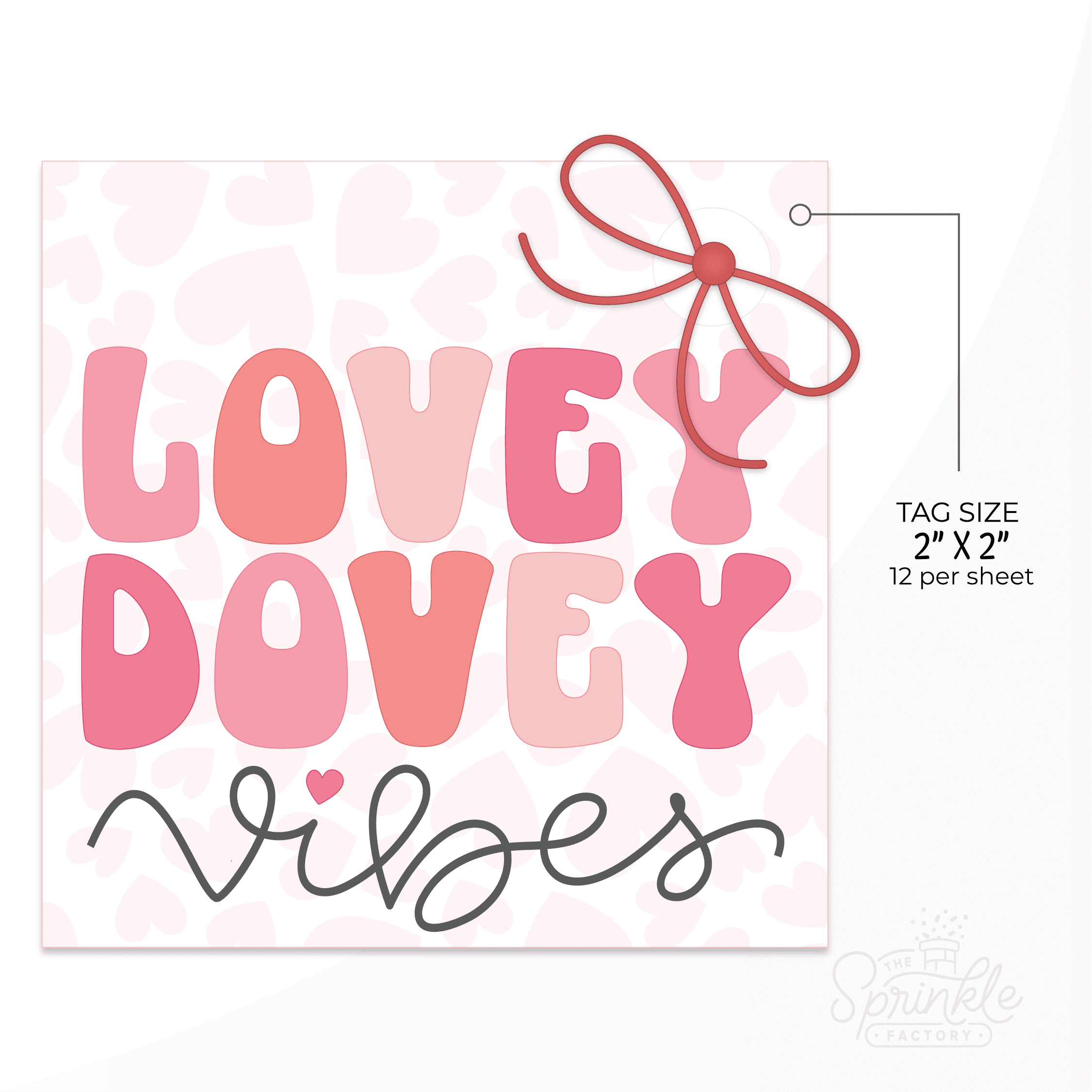 Clipart of a square white tag with a pink heart print on it with a hole for a red bow with LOVEY DOVEY written on it in alternating pink shades and vibes written below in black cursive lettering and size guide.