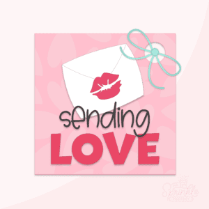 Clipart of a pink square tag with a hole for a mint green bow with pale pink hearts on the background of the tag with a white envelope in the middle with a red kiss on it and text being that says sending in black and LOVE in red.