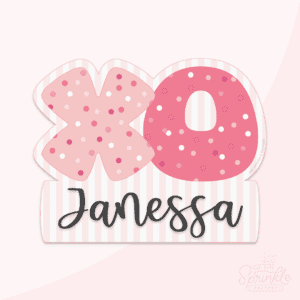 Clipart of a name plaque with a large XO on top with the X being a medium pink and the O being dark pink and both covered in pink and white sprinkles with the name Janessa below in black and written in cursive letters all on top of a pink and white stripped background.