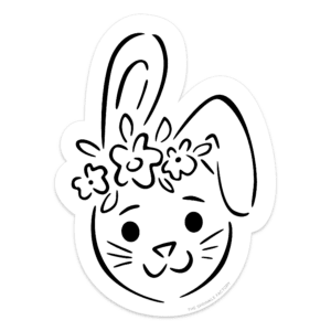 Clipart of a black and white drawing of a bunny head with 1 ear pointing up and the other folded down wearing a flower crown.