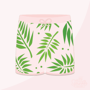 Clipart of a light pink swim trunk with green palm leaves on them.