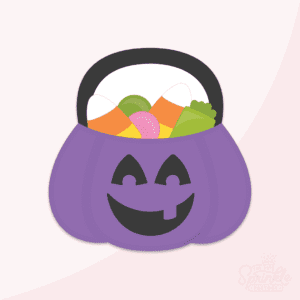 Clipart of a purple pumpkin trick or treat basket with a black face on it, a black handle and candy in the top.