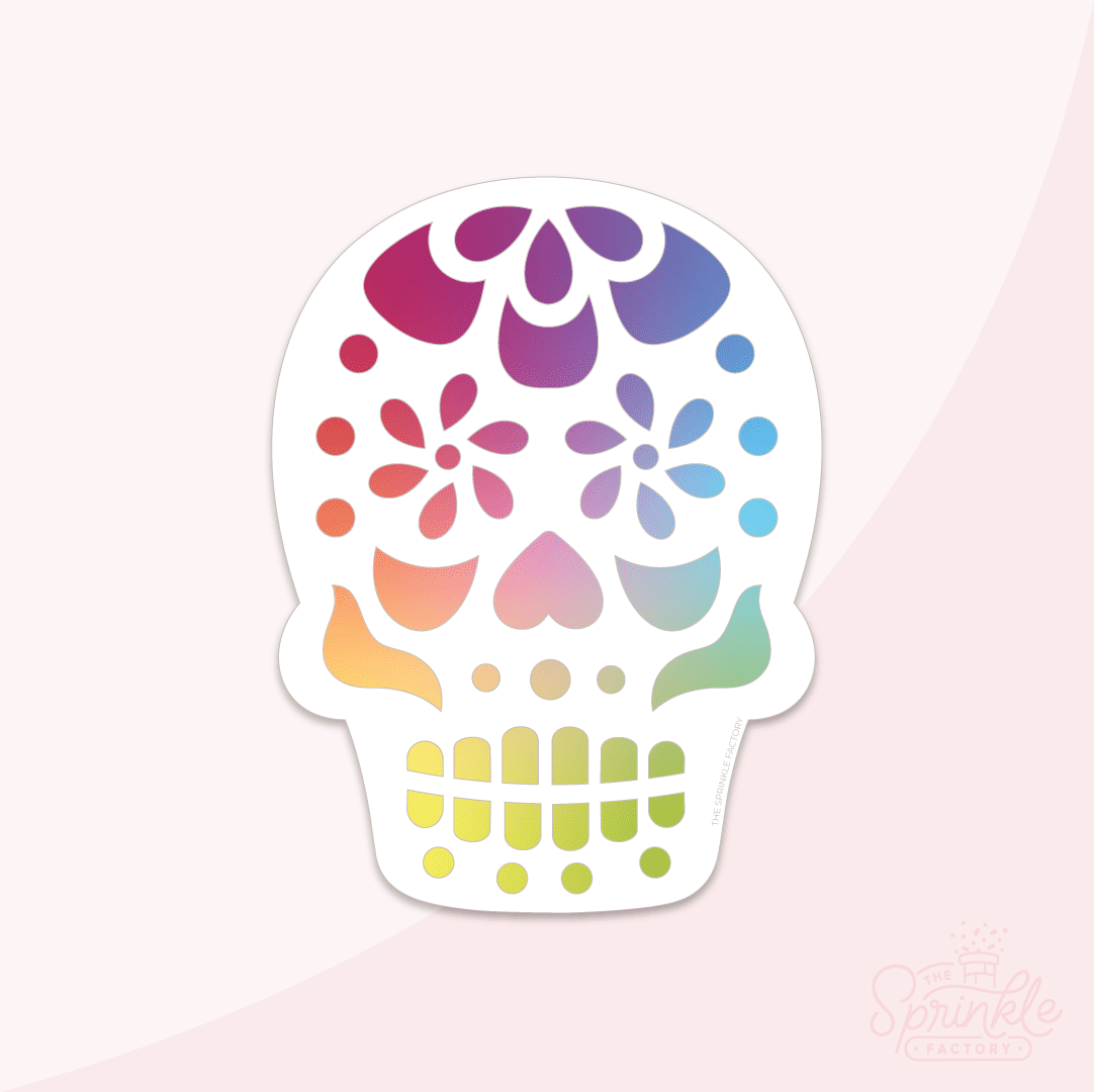 Clipart of a white sugar skull with a classic rainbow pattern design.