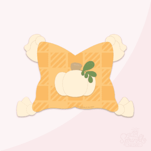 Clipart of an orange pillow with a plaid pattern and a cream pumpkin in the middle with cream tassels on the corners.