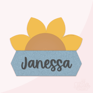 Clipart of a golden sunflower with brown center with a blue jean print plaque below with the name Janessa in black cursive font.