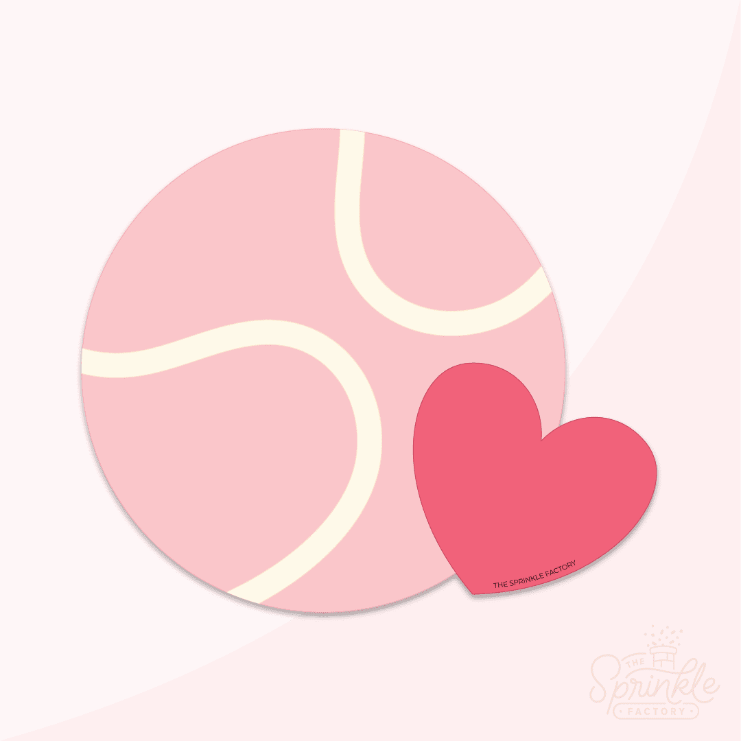 Clipart of a pink tennis ball with red heart.