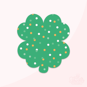 Clipart of a green shamrock with green gold and white sprinkles.