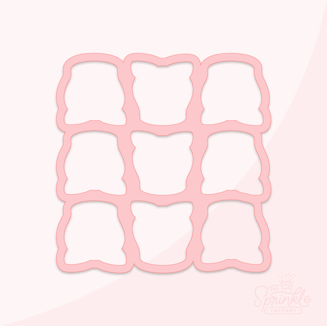 Clipart of a pink cookie cutter that cuts out 9 mini roses.