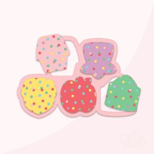 A digital image of colorful school supply frosted crackers that are cookie cutters on a pink background.